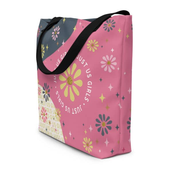 all-over-print-large-tote-bag-w-pocket-black-front-dancing-daisies-front-side-view.jpg