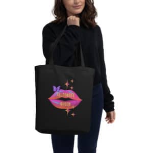 eco-tote-bag-black-front-holding-celebrate-queen.jpg